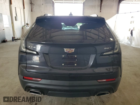 2023 Cadillac XT4 AWD Sport z VIN 1GYFZFR41PF103650, wystawiony jako Copart lot #59321355 z przebiegiem 27 092 mil mil oraz Szkoda całkowita • Salvage title. Historia ofert i sprzedaży dostępna na DreamBid. Obrazek 6.