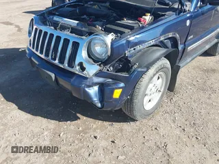 2006 Jeep Liberty Sport with VIN 1J4GL48K26W214748, listed as a IAAI auction lot 41875513 with 105,941 mi miles. Bid and sale history available at carsss.com. Image 6.