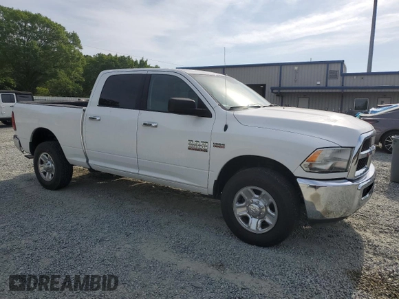 2015 Ram 2500 with VIN 3C6TR4DT4FG573333, listed as a Copart auction lot 54758515 with 182,000 mi miles and Salvage title. Bid and sale history available at DreamBid. Image 4.