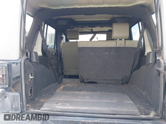 2008 Jeep Wrangler Unlimited Sahara with VIN 1J4GB59198L619802, listed as a IAAI auction lot 42361793 with 272,295 mi miles and . Bid and sale history available at DreamBid. Image 18.