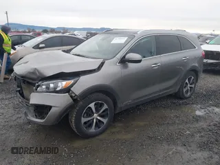 2017 Kia Sorento EX with VIN 5XYPHDA50HG309241, listed as a IAAI auction lot 41799412 with 104,890 mi miles and . Bid and sale history available at DreamBid. Image 2.