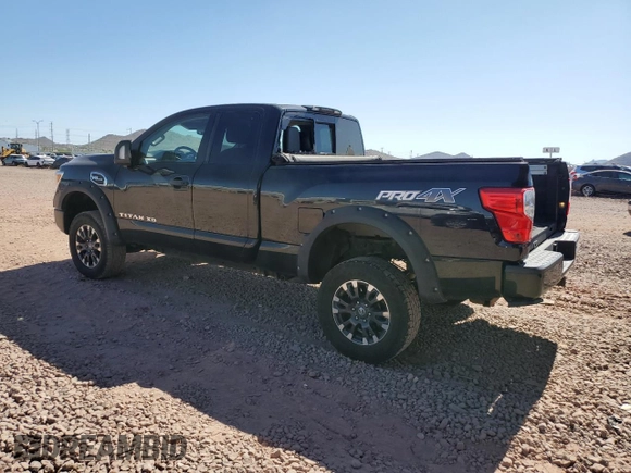 2018 Nissan Titan with VIN 1N6AA1C43JN549358, listed as a Copart auction lot 62417435 with 125,394 mi miles and Salvage title. Bid and sale history available at DreamBid. Image 2.
