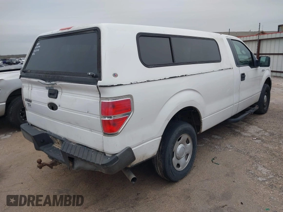 2009 Ford F-150 XL with VIN 1FTRF12839KA68521, listed as a IAAI auction lot 41307002 with 191,999 mi miles. Bid and sale history available at carsss.com. Image 4.