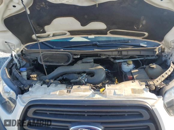 2018 Ford Transit z VIN 1FTYR2YM8JKA77474, wystawiony jako Copart lot #65424094 z przebiegiem 112 955 mil mil oraz Szkoda całkowita • Salvage title. Historia ofert i sprzedaży dostępna na DreamBid. Obrazek 13.