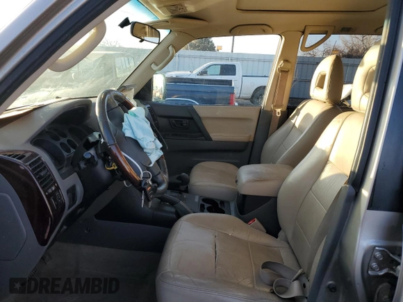 2001 Mitsubishi Montero Limited z VIN JA4MW51R41J037651, wystawiony jako Copart lot #43964815 z przebiegiem 155 578 mil mil oraz Tytuł czysty. Historia ofert i sprzedaży dostępna na DreamBid. Obrazek 7.