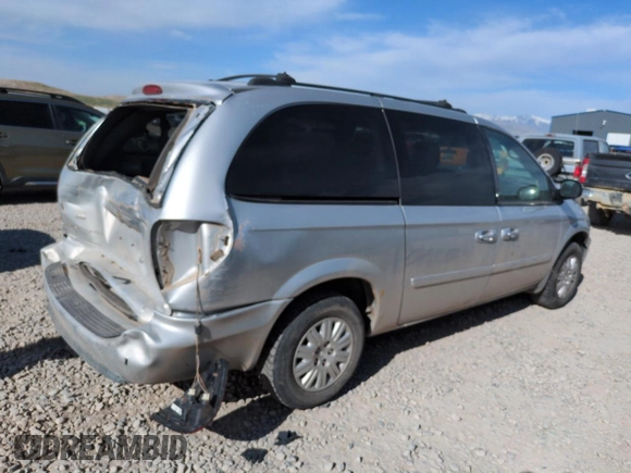 2005 Chrysler Town & Country LX with VIN 2C4GP44R25R483773, listed as a Copart auction lot 52019725 with 244,319 mi miles and Salvage Title. Bid and sale history available at DreamBid. Image 3.