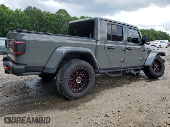 2021 Jeep Gladiator Rubicon с VIN 1C6JJTBG5ML507579, выставлен на аукционе Copart как лот 60409785 с пробегом 62 585 миль миль и Списание • Salvage title. История ставок и продаж доступна на DreamBid. Изображение 3.
