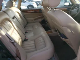 1999 Jaguar XJ with VIN SAJHD1048XC867723, listed as a Copart auction lot 76745444 with 170,999 mi miles and Salvage Title. Bid and sale history available at carsss.com. Image 11.