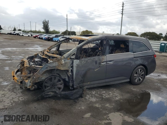 2015 Honda Odyssey Touring Elite with VIN 5FNRL5H90FB129008, listed as a Copart auction lot 47995945 with Not provided miles and Non repairable. Bid and sale history available at DreamBid. Image 1.
