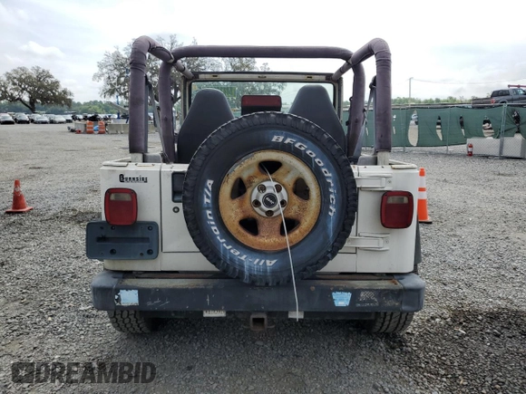 1997 Jeep Wrangler Sport with VIN 1J4FY19S9VP430180, listed as a Copart auction lot 50430055 with 0 mi miles and Salvage Title. Bid and sale history available at carsss.com. Image 6.