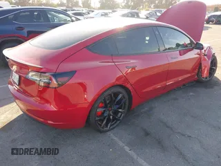 2021 Tesla Model 3 Performance with VIN 5YJ3E1EC9MF926301, listed as a IAAI auction lot 40959721 with 28,094 mi miles and . Bid and sale history available at DreamBid. Image 4.