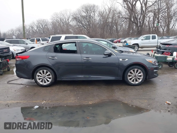2017 Kia Optima LX z VIN 5XXGT4L38HG139029, wystawiony jako IAAI lot #41170780 z przebiegiem 131 201 mil mil oraz . Historia ofert i sprzedaży dostępna na DreamBid. Obrazek 13.