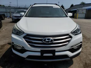 2017 Hyundai Santa Fe 2.4L z VIN 5NMZUDLB7HH018961, wystawiony jako Copart lot #60418395 z przebiegiem 107 830 mil mil oraz Czysty tytuł • Clean title. Historia ofert i sprzedaży dostępna na DreamBid. Obrazek 5.