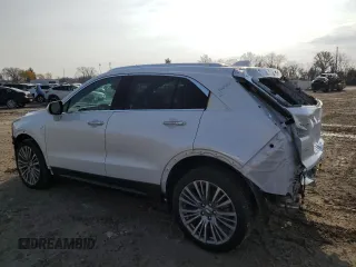 2024 Cadillac XT4 AWD Premium Luxury with VIN 1GYFZDR40RF225603, listed as a Copart auction lot 87899975 with 1,659 mi miles and Salvage title. Bid and sale history available at DreamBid. Image 2.