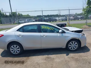 2016 Toyota Corolla L with VIN 5YFBURHE9GP414816, listed as a IAAI auction lot 42424221 with 87,270 mi miles and . Bid and sale history available at DreamBid. Image 13.