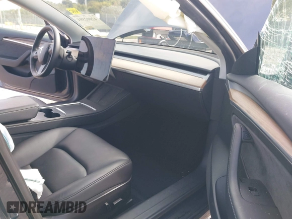 2023 Tesla Model 3 z VIN 5YJ3E1EA0PF403168, wystawiony jako IAAI lot #42002584 z przebiegiem 35 875 mil mil oraz . Historia ofert i sprzedaży dostępna na DreamBid. Obrazek 5.