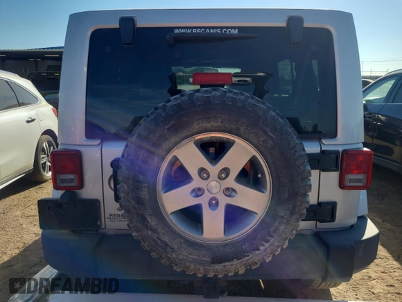2012 Jeep Wrangler Unlimited Call of Duty MW3 с VIN 1C4BJWFG3CL103865, выставлен на аукционе Copart как лот 74237754 с пробегом 104 232 миль миль и Списание • Salvage title. История ставок и продаж доступна на DreamBid. Изображение 6.
