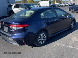 2021 Toyota Corolla Hybrid LE with VIN JTDEAMDE0MJ009233, listed as a Copart auction lot 50191765 with 212,244 mi miles and Clean Title. Bid and sale history available at carsss.com. Image 4.