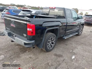2014 GMC Sierra 1500 SLT with VIN 1GTV2VEJXEZ389280, listed as a IAAI auction lot 41370436 with 124,311 mi miles. Bid and sale history available at carsss.com. Image 4.
