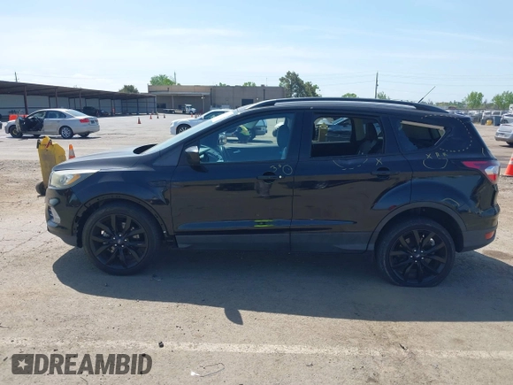 2017 Ford Escape SE with VIN 1FMCU0G9XHUE37185, listed as a IAAI auction lot 42053979 with 72,904 mi miles. Bid and sale history available at carsss.com. Image 14.