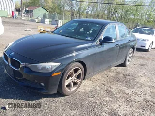 2015 BMW 3 Series 320i with VIN WBA3B1G55FNT04870, listed as a IAAI auction lot 42141211 with 249,720 mi miles. Bid and sale history available at carsss.com. Image 2.