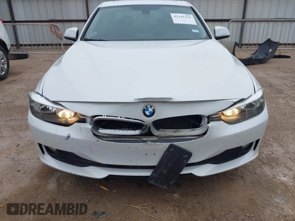 2015 BMW 3 Series 320i with VIN WBA3B1C5XFK140734, listed as a IAAI auction lot 42141319 with 84,863 mi miles and . Bid and sale history available at DreamBid. Image 6.