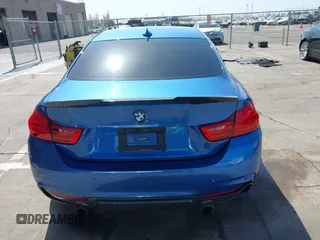 2015 BMW 4 Series 435i with VIN WBA3R1C50FF774588, listed as a IAAI auction lot 42001394 with 96,400 mi miles and . Bid and sale history available at carsss.com. Image 17.