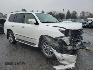 2015 Lexus LX 570 with VIN JTJHY7AXXF4185222, listed as a Copart auction lot 83833874 with 165,154 mi miles and Salvage Title. Bid and sale history available at DreamBid. Image 4.