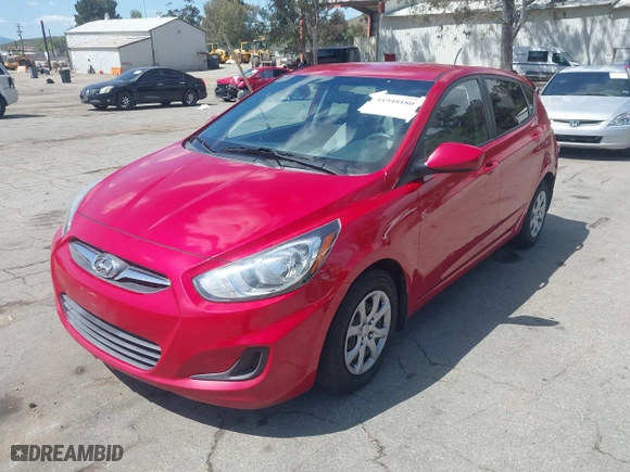 2014 Hyundai Accent GS with VIN KMHCT5AE9EU174866, listed as a IAAI auction lot 41948180 with 117,985 mi miles. Bid and sale history available at carsss.com. Image 2.