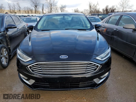 2018 Ford Fusion Titanium with VIN 3FA6P0RU5JR120394, listed as a Copart auction lot 73557602 with 148,870 mi miles and . Bid and sale history available at DreamBid. Image 5.