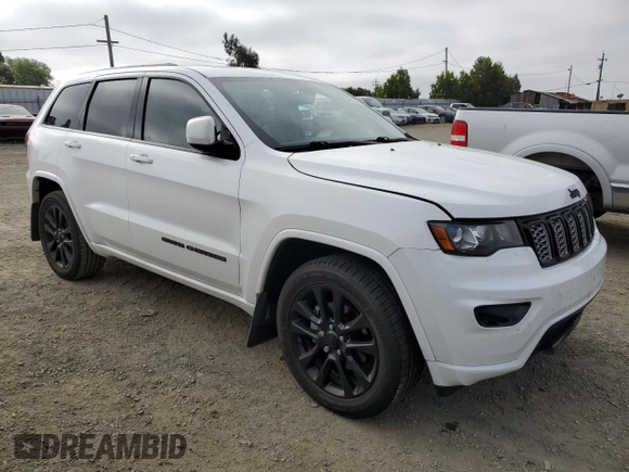 2017 Jeep Grand Cherokee Laredo with VIN 1C4RJEAG2HC702859, listed as a Copart auction lot 54891225 with Not provided miles and Salvage title. Bid and sale history available at DreamBid. Image 4.
