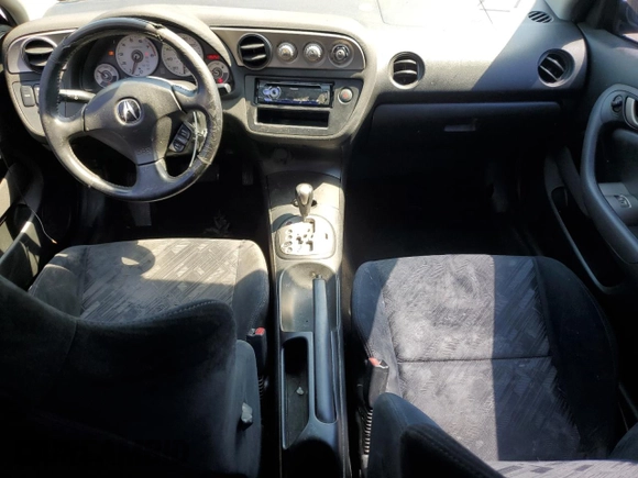 2002 Acura RSX Auto with VIN JH4DC548X2C030807, listed as a Copart auction lot 65178665 with 138,260 mi miles and Salvage title. Bid and sale history available at DreamBid. Image 8.