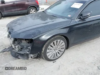 2015 Audi A8 L 4.0T with VIN WAU32AFD7FN006233, listed as a IAAI auction lot 41353034 with 119,693 mi miles. Bid and sale history available at carsss.com. Image 17.