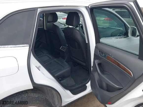 2016 Audi Q5 Premium with VIN WA1C2AFP1GA140297, listed as a IAAI auction lot 41374004 with 104,196 mi miles. Bid and sale history available at carsss.com. Image 8.