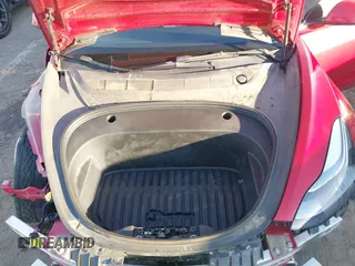 2022 Tesla Model 3 with VIN 5YJ3E1EA1NF288903, listed as a IAAI auction lot 41610215 with 96,050 mi miles and . Bid and sale history available at DreamBid. Image 10.