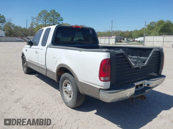 2003 Ford F-150 XL with VIN 1FTRX17L03NA16778, listed as a IAAI auction lot 41602179 with 219,101 mi miles. Bid and sale history available at carsss.com. Image 3.