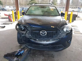 2014 Mazda CX-5 Grand Touring with VIN JM3KE2DY6E0394172, listed as a IAAI auction lot 41698468 with 89,554 mi miles. Bid and sale history available at carsss.com. Image 12.