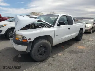 1998 Dodge Dakota SLT with VIN 1B7GL22X0WS654957, listed as a Copart auction lot 48569595 with 0 mi miles and Salvage Title. Bid and sale history available at carsss.com. Image 1.