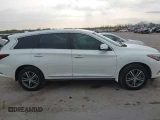 2020 Infiniti QX60 Pure with VIN 5N1DL0MN2LC531102, listed as a IAAI auction lot 41918887 with 55,284 mi miles and . Bid and sale history available at DreamBid. Image 14.