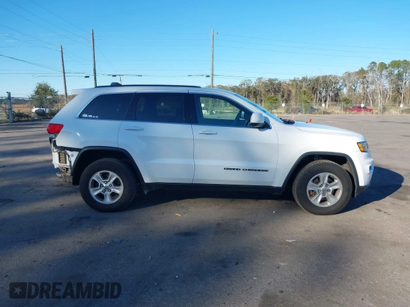 2017 Jeep Grand Cherokee Laredo with VIN 1C4RJFAG7HC688625, listed as a IAAI auction lot 41295860 with 115,714 mi miles. Bid and sale history available at carsss.com. Image 13.