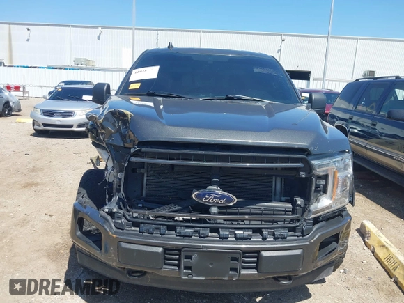 2020 Ford F-150 XL with VIN 1FTEW1E50LKE93170, listed as a IAAI auction lot 41918973 with 99,117 mi miles and . Bid and sale history available at carsss.com. Image 12.