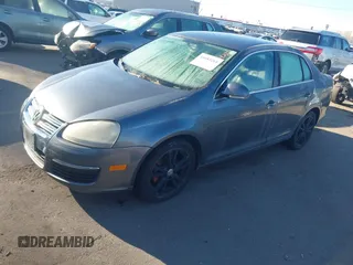 2007 Volkswagen Jetta z VIN 3VWJF71K97M021624, wystawiony jako IAAI lot #41682214 z przebiegiem Nie podano mil oraz . Historia ofert i sprzedaży dostępna na DreamBid. Obrazek 2.
