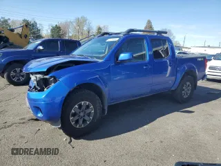 2015 Nissan Frontier Pro-4X with VIN 1N6AD0EV2FN736394, listed as a Copart auction lot 53916455 with 116,801 mi miles and Salvage title. Bid and sale history available at DreamBid. Image 1.
