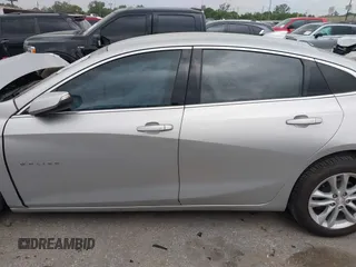 2018 Chevrolet Malibu LT z VIN 1G1ZD5ST6JF261270, wystawiony jako IAAI lot #41932928 z przebiegiem 127 971 mil mil oraz . Historia ofert i sprzedaży dostępna na DreamBid. Obrazek 14.