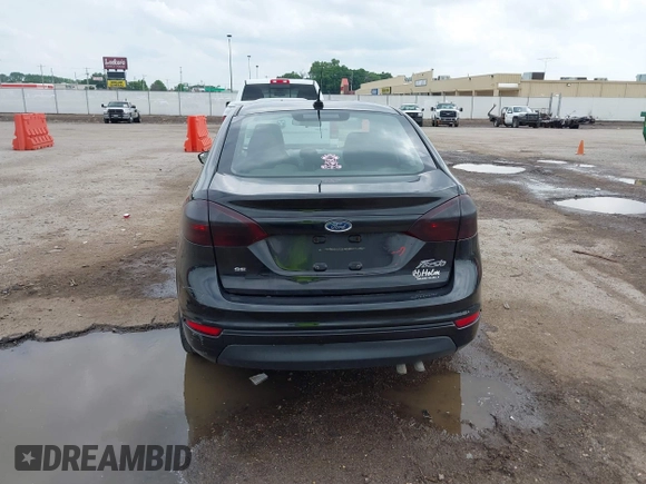 2015 Ford Fiesta SE with VIN 3FADP4BJXFM135864, listed as a IAAI auction lot 39462016 with 113,486 mi miles and . Bid and sale history available at DreamBid. Image 16.
