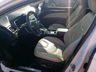 2017 Ford Fusion Titanium с VIN 3FA6P0K99HR118082, выставлен на аукционе Copart как лот 55459615 с пробегом 89 148 миль миль и Чистый • Clean title. История ставок и продаж доступна на DreamBid. Изображение 7.