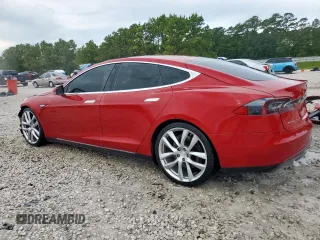 2014 Tesla Model S 60 with VIN 5YJSA1H11EFP43669, listed as a Copart auction lot 62368605 with Not provided miles and Salvage title. Bid and sale history available at DreamBid. Image 2.