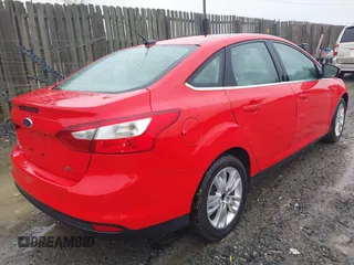 2012 Ford Focus SEL with VIN 1FAHP3H25CL162575, listed as a IAAI auction lot 42018674 with 237,745 mi miles. Bid and sale history available at carsss.com. Image 4.