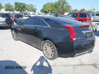 2012 Cadillac CTS Premium z VIN 1G6DP1E3XC0116593, wystawiony jako IAAI lot #42138575 z przebiegiem 198 884 mil mil oraz . Historia ofert i sprzedaży dostępna na DreamBid. Obrazek 3.