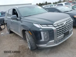 2023 Hyundai Palisade Calligraphy z VIN KM8R7DGE0PU640381, wystawiony jako IAAI lot #41601559 z przebiegiem 20 418 mil mil oraz . Historia ofert i sprzedaży dostępna na DreamBid. Obrazek 1.